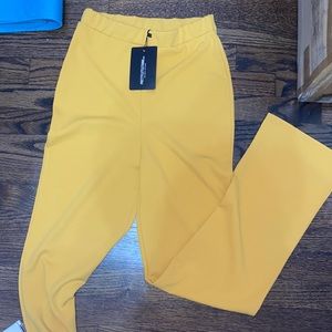 Brand new . High waist . Mustard straight leg crepe. Stretchy & comfortable.